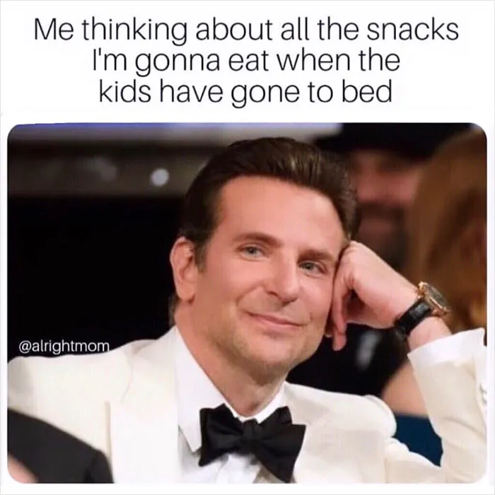 Man in a suit with a smirk, caption about eating snacks after kids sleep, representing average parent problems.