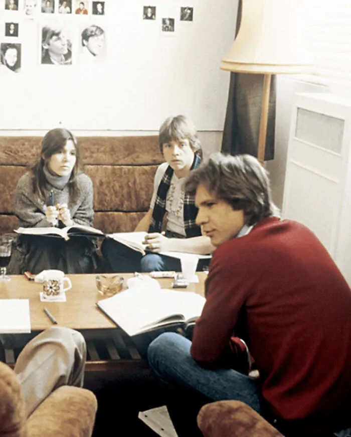 Carrie Fisher, Mark Hamill, And Harrison Ford Going Over The Script For The Empire Strikes Back (1979)