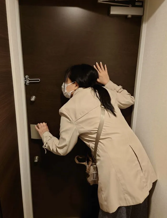 A Person Who Has To Leave At The Same Time As Their Neighbor And Tries To Avoid Them
