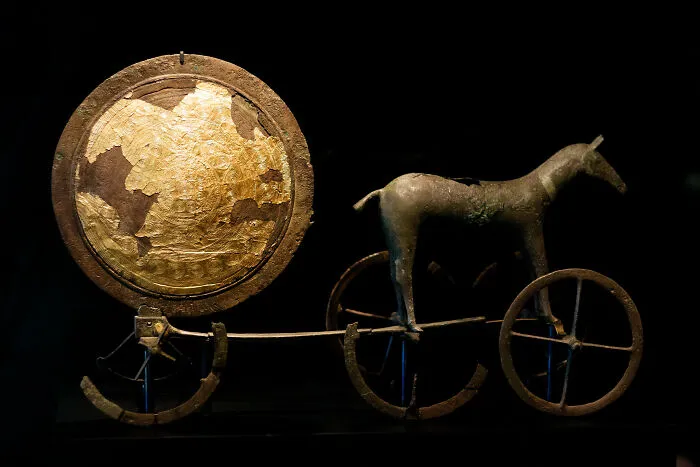 Ancient artifact depicting a horse and sun chariot, revealing important historical information.