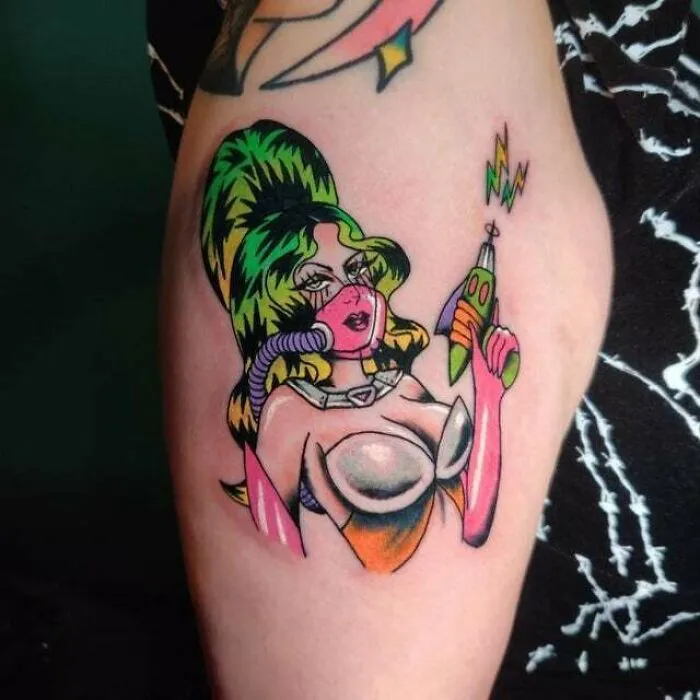 Colorful sci-fi girl arm tattoo, featuring vibrant and trippy design elements.