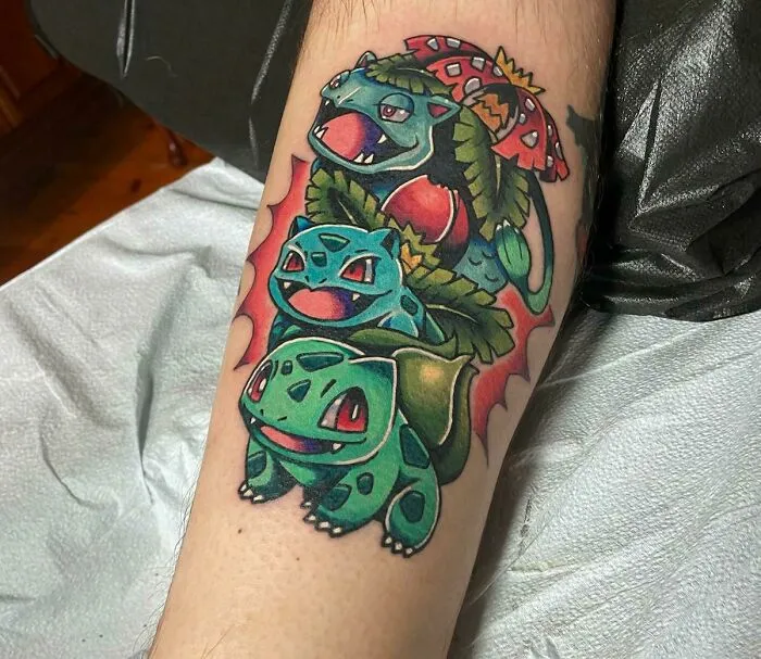Colorful cartoon tattoo of animated characters from a beloved show on a person's arm.