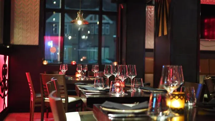 Cozy restaurant setting with dim lighting, perfect for a festive New Year's Eve celebration.
