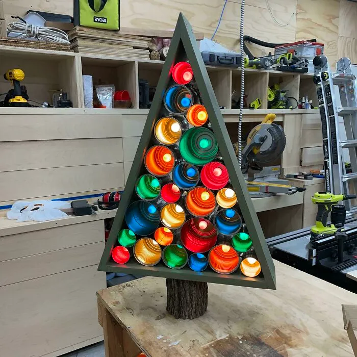 This Is Hardly Fine Woodworking, But I Just Made This Festive Tin Can Tree Decoration With Basic Pine And A Tree Branch For A Trunk. Love How It Turned Out