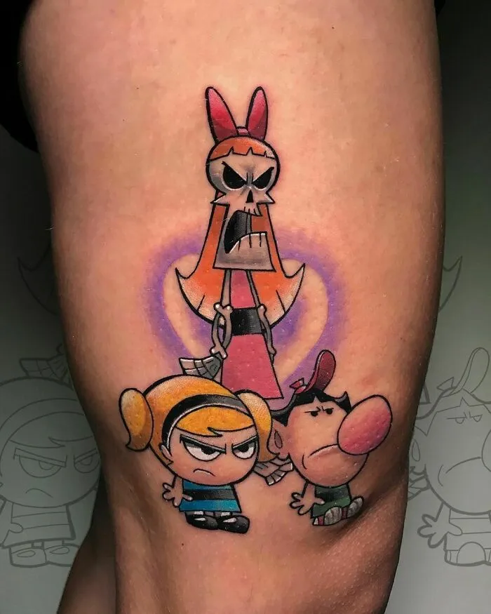Cartoon tattoo featuring characters from an animated show with a bold, colorful design on skin.