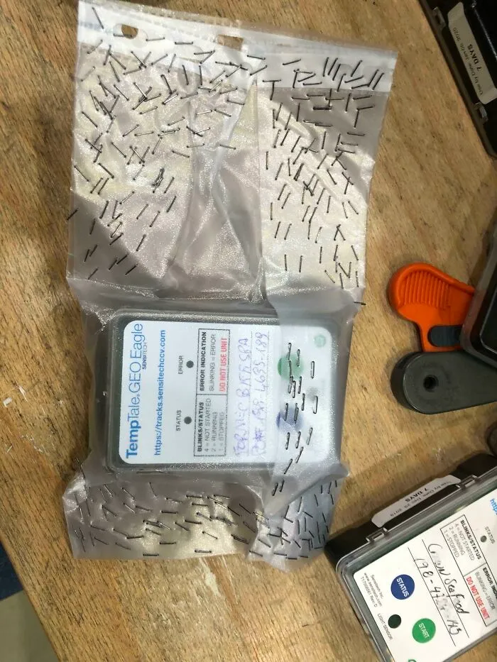 So This Package Arrived At My Work Today. All I Can Imagine Is Someone Taking Half An Hour To Staple This Package Shut