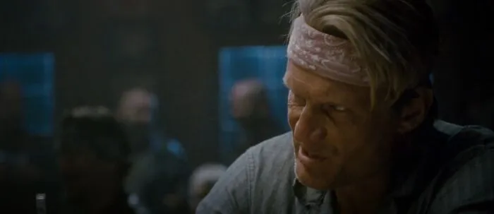 In The Expendables 2 (2012) Dolph Lundgrens Character, Gunnar, Is Said To Have Achieved A Masters In Chemical Engineering Then Quit To Be A Bouncer In Attempt To Form A Relationship With "This Girl". All Of Which Dolph Lundgren Actually Did In Real Life. The Girl Was Grace Jones