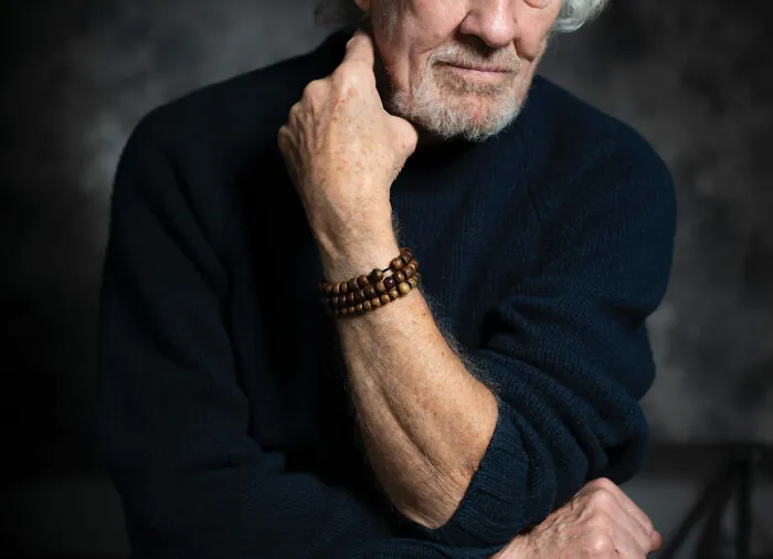 man wearing wooden bracelet 