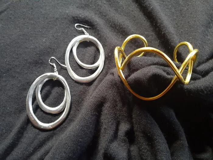 Earrings And A Bracelet Plus A Hamper Full Of Goodies