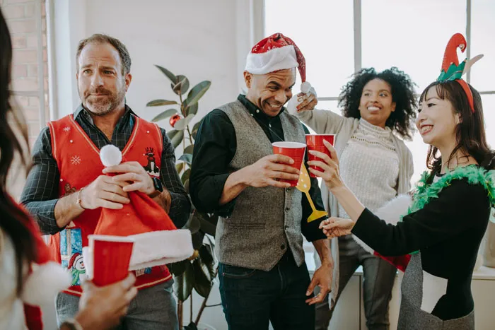 workers celebrate something in the office
