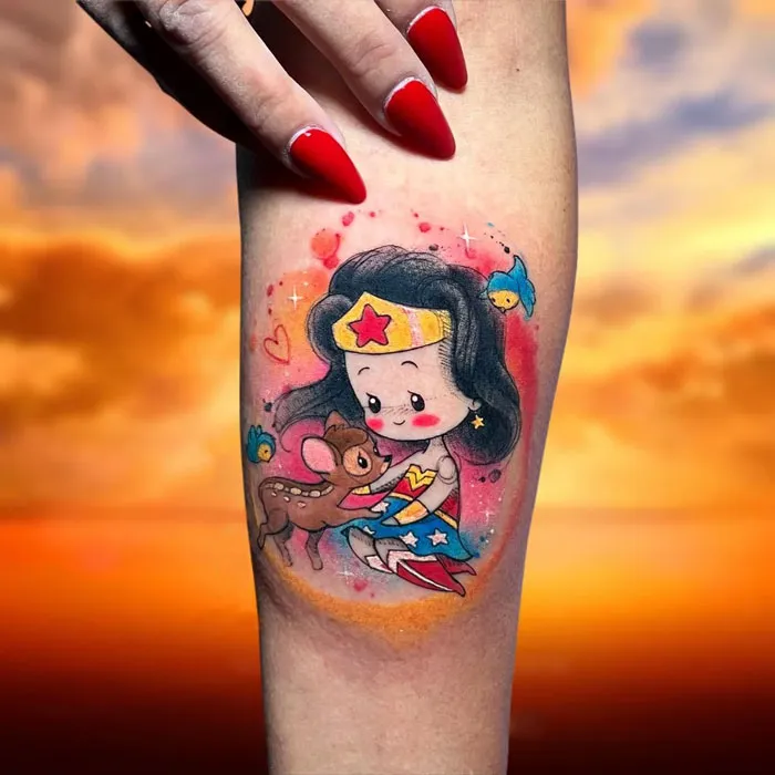 Cartoon tattoo of a character in a colorful setting on forearm, inspired by animated shows, with a sunset background.