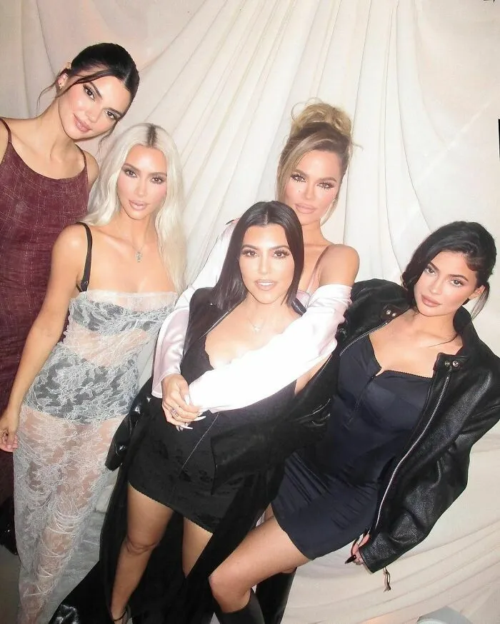 Group of stylish celebrities posing together, showcasing beauty and charm representing smartest celebrities and intelligence.