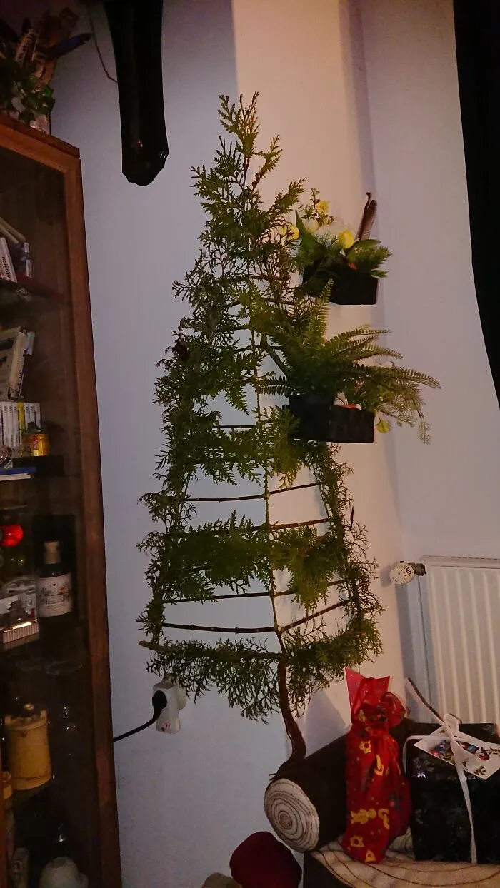 -Work In Progress - We Don't Have Much Space But Have A Protruding Corner Of The Wall.  I'm Curious How It Will Look Like In The End.  I'm Out Of Green Branches So I'll Add Lights And Ornaments.  The Last Few Years I've Made A Stylized Tree With Wrapping Paper There