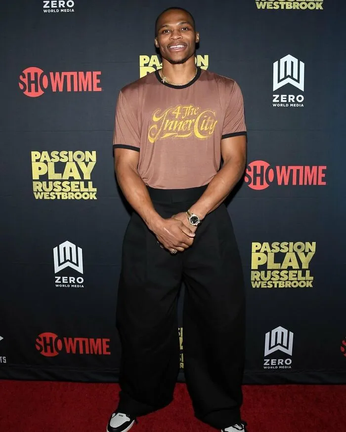 Athlete and actor Russell Westbrook at a Passion Play event, featured among smartest celebrities known for talent and intelligence.