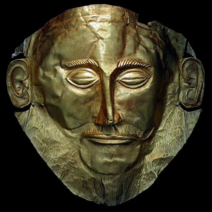 Gold funeral mask representing a historical artifact with significant cultural insight.