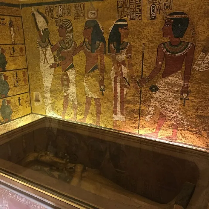 Ancient Egyptian artifacts depicting colorful wall art in a tomb, revealing important historical information.
