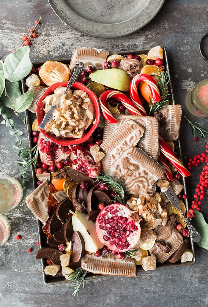Christmas breakfast with fruits, cookies and candies