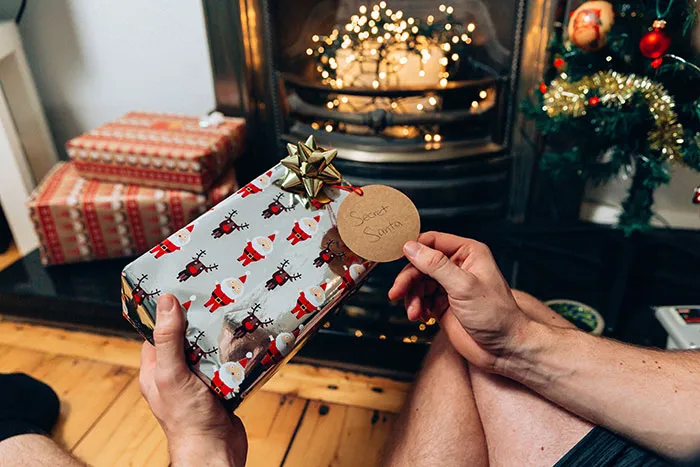 Person holding Christmas gift