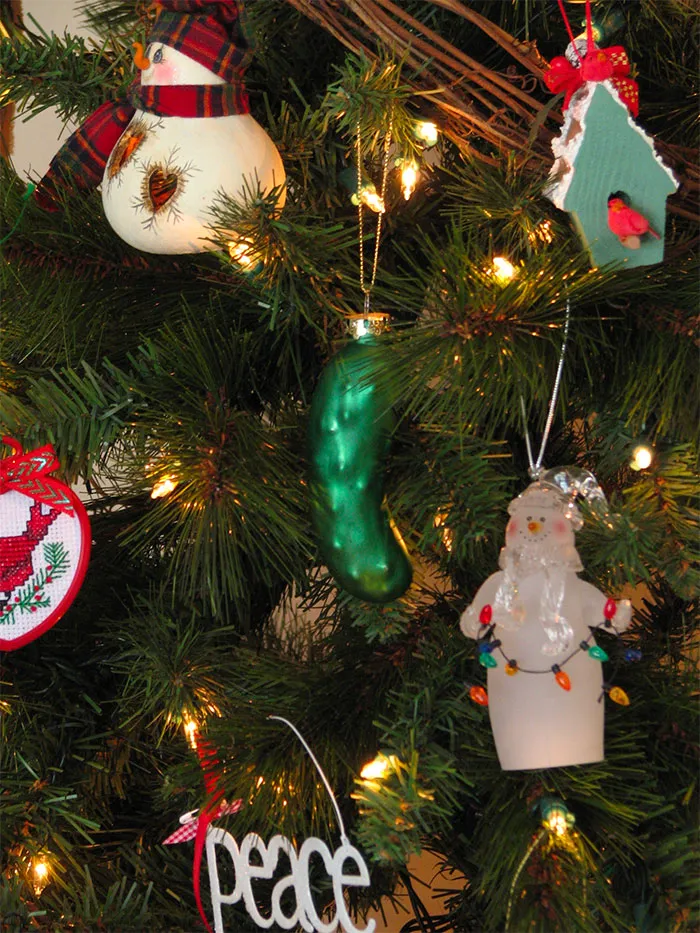 Pickle ornament on Christmas tree