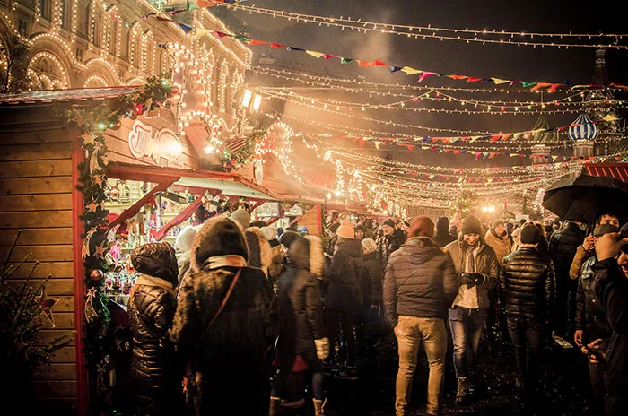 Persons walking in Christmas market