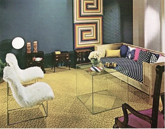 The Nice Thing About The Coffee Table Is That The Blood From The Scraped Shins Wipes Off Easily. I'm Not Sure If The Wicker Couch Matches The Faux Sheepskin Chairs That Don't Go With The Fake Colonial Side Table Sitting Next To The Tourist Souvenir Tiki Idols, But The Polka Dots On The Couch Really Pull It All Together
