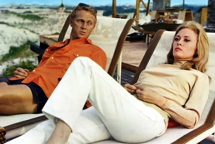 Vicki and Thomas lying on the beach chairs 