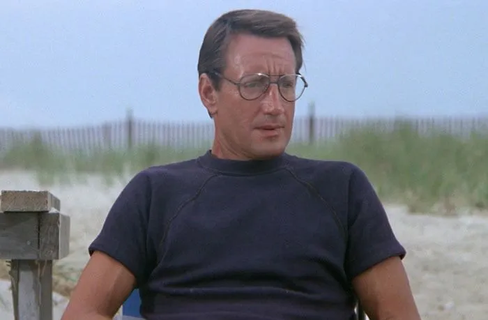 Martin Brody wearing dark blue t-shirt 