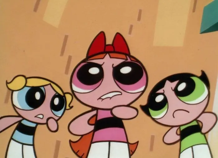 Female cartoon characters displaying strength and determination.