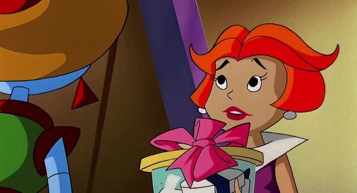 Female cartoon character holding a gift with a pink bow, showcasing fame and strength.