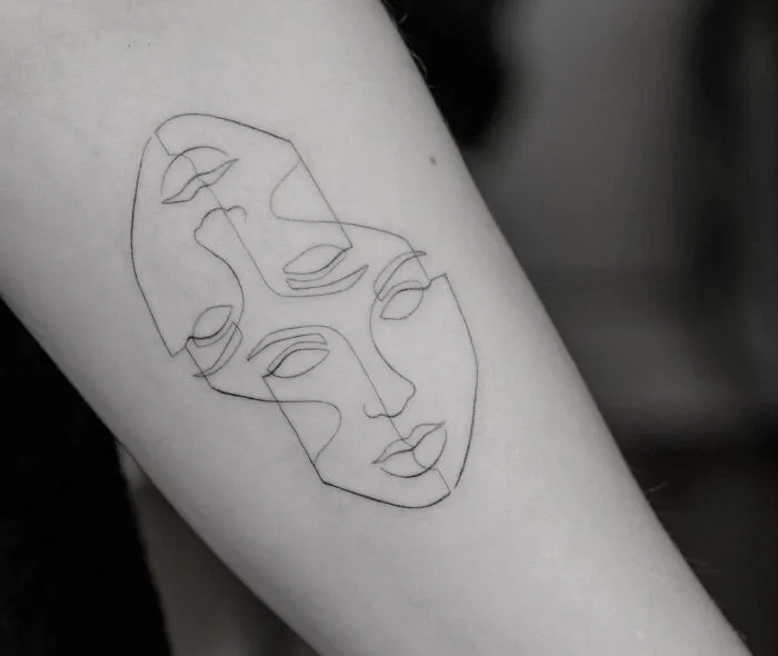 Single Line Faces Tattoo
