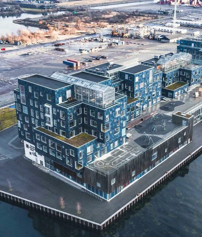 Sexy And Sustainable. This School In Copenhagen Has Solar Panels In Its Facade That Supplies Half Its Energy Consumption