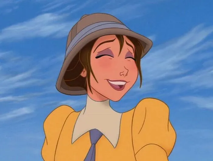 A smiling female cartoon character in a yellow outfit and hat, representing fame and strength against a blue sky.