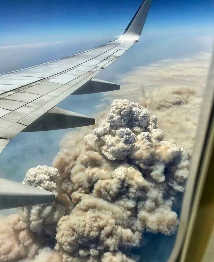 Picture From Plane Window Flying Over The Wildfires In Australia