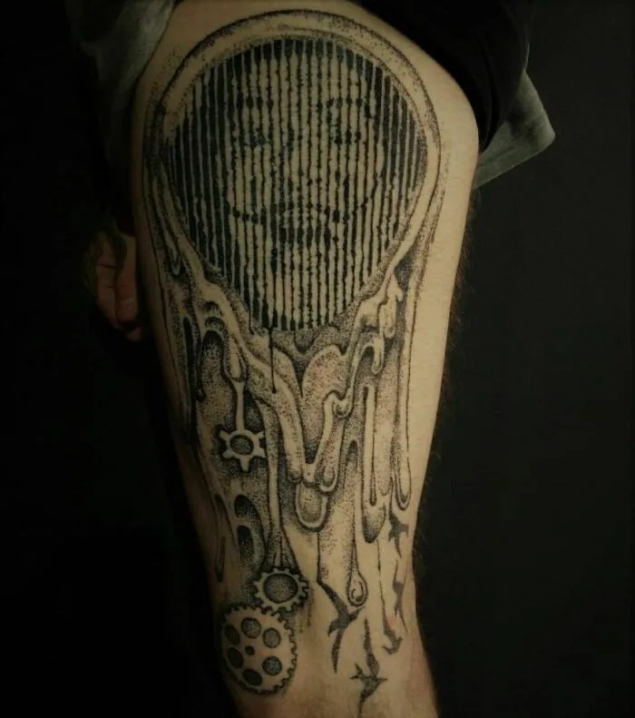 Optical illusion tattoo design featuring a melting face with intricate details on a person's leg.
