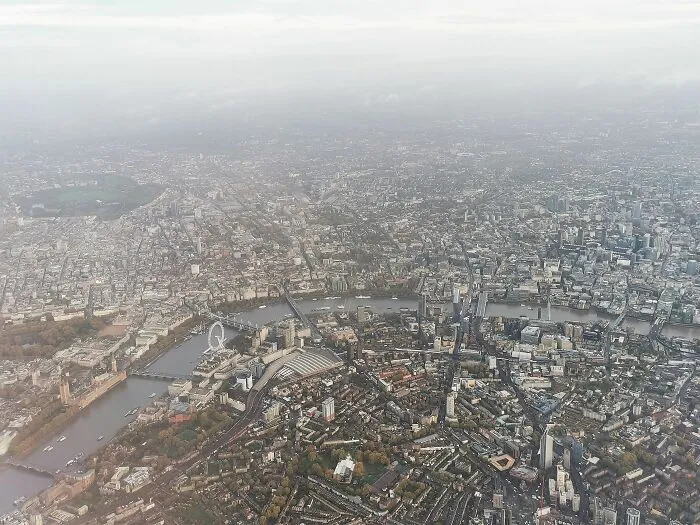 Central London With The Houses Of Parliament, London Eye, Waterloo Station And The River Thames. You May Also See St Paul's Cathedral