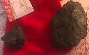 Person Goes To Celebrate Christmas With Fiancé's Family For The First Time, Loses It After Getting 18 Pieces Of Coal As Gifts