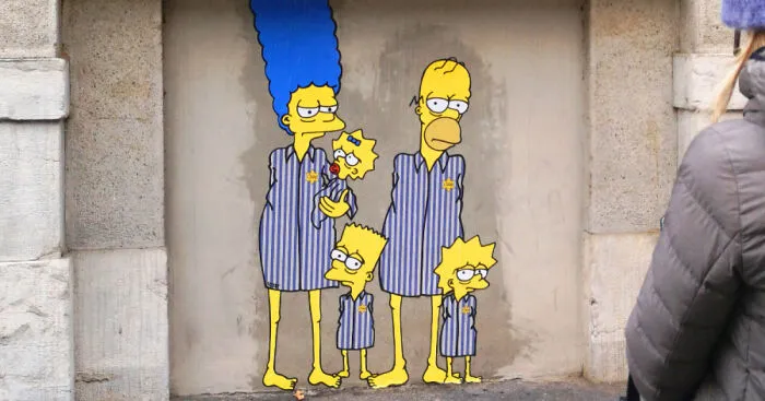 This Artist Paints ‘Simpsons’ Characters As Holocaust Victims Outside The Milan Shoah Memorial