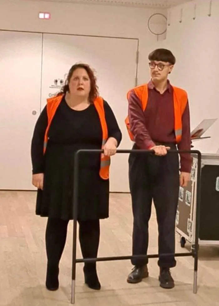 German Climate Activists Glue Themselves To The Conductor's Stand At A Concert. The Stand Is Removable So They Were Taken Offstage