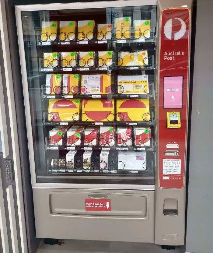 The Post Office Box Has A Vending Machine For Stamps And Parcels