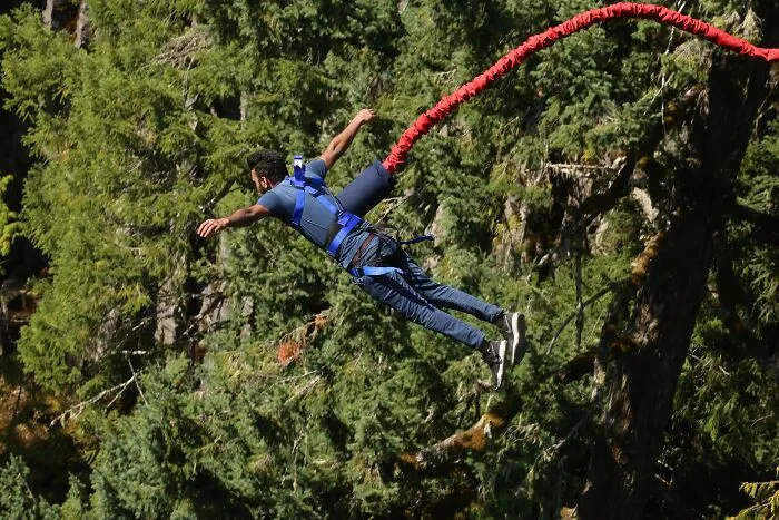 Man Bungee Jumping From The Bridge 