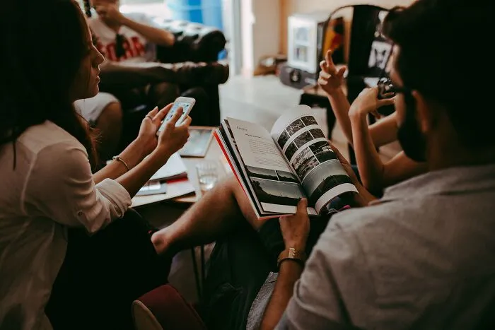 Group Of Friends Communicating With Each Other 