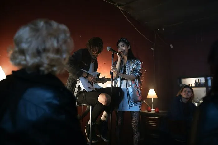 Woman Singing Karaoke In Front Of Strangers 