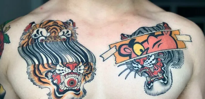 Colorful trippy tiger tattoos on chest, showcasing psychedelic art.