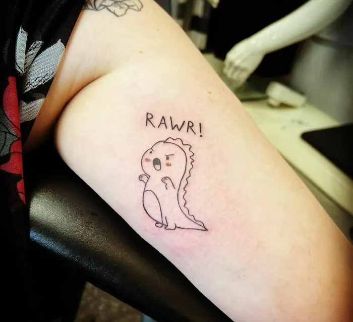 Funny Dinosaur Hand Tattoo