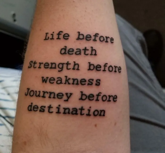 Tattoo with inspirational quote emphasizing life, strength, and journey over death, weakness, and destination.