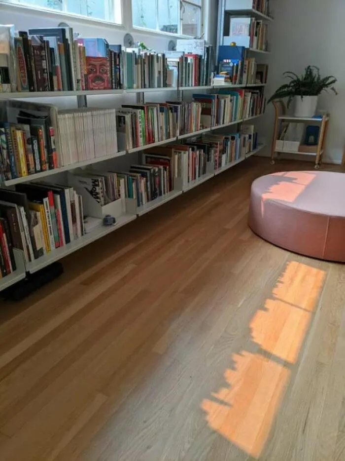 The Shadow Of My Bookshelf Looks Like A City Skyline