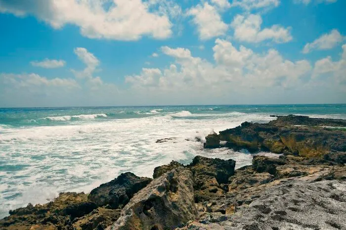 Ocean with rocks near in Cozumel