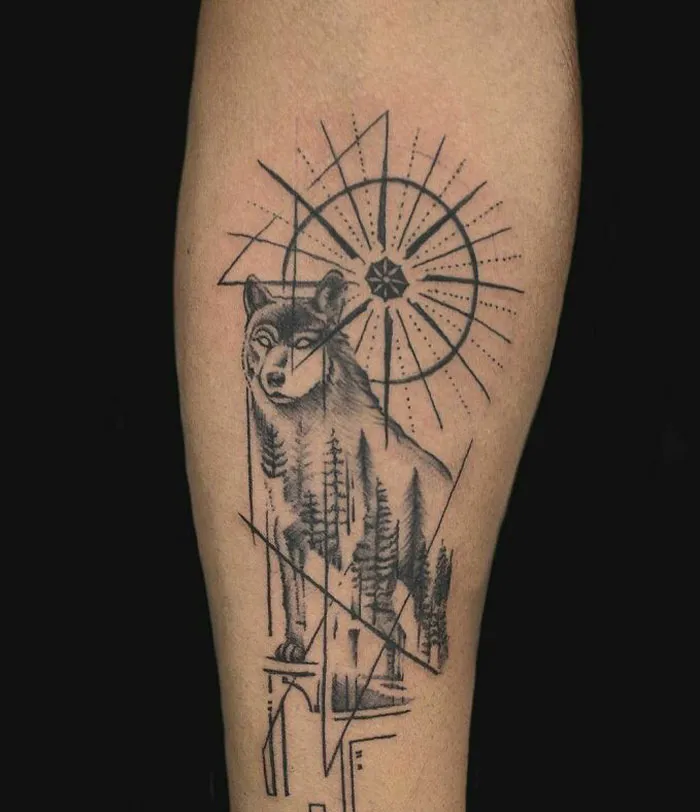 Wolf geometric tattoo design featuring shapes and forms on an arm, showcasing creativity.