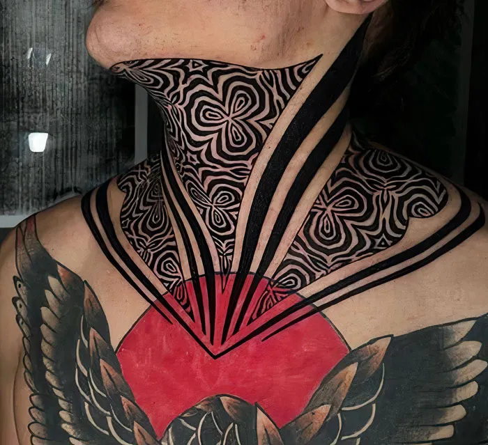 Geometric tattoo design with intricate shapes on neck and chest, showcasing creativity and bold forms.