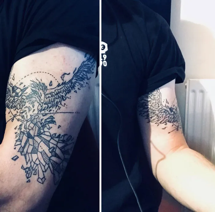 Arm showcasing a geometric tattoo design featuring intricate shapes and forms in black ink.
